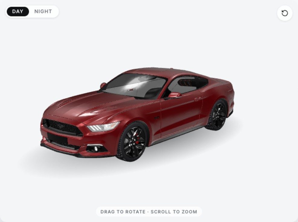 Mustang in satin red with the blackout package in daylight